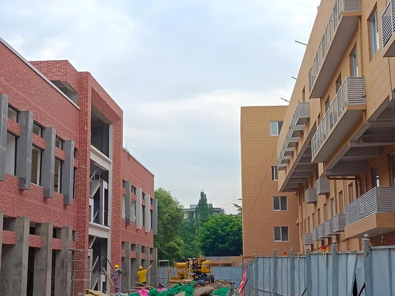 University building with split brick wall design